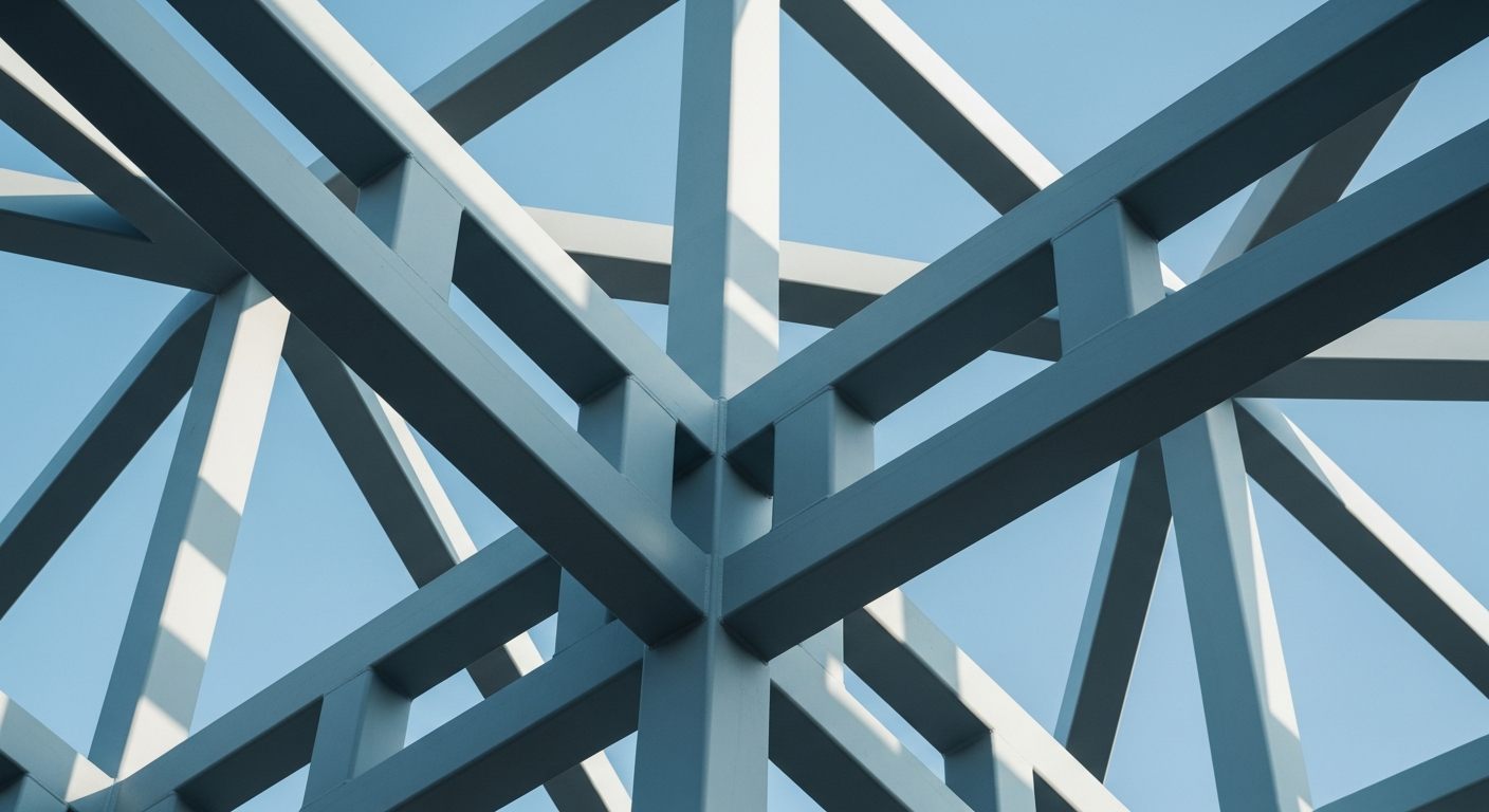 Abstract close-up of a modern high-rise's structural steel framework against a blue sky